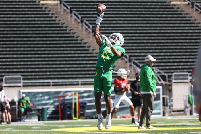 Wright goes through drills at Oregon spring football practice at Autzen Stadium.